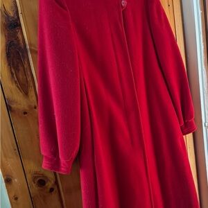 Vintage gorgeous red wool coat. Hidden buttons. Made in New York. Fully lined.